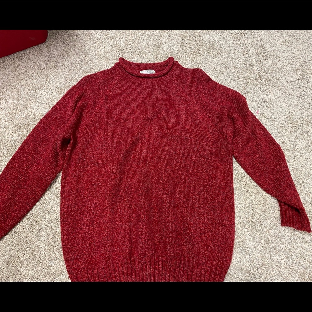 Red woman’s sweater